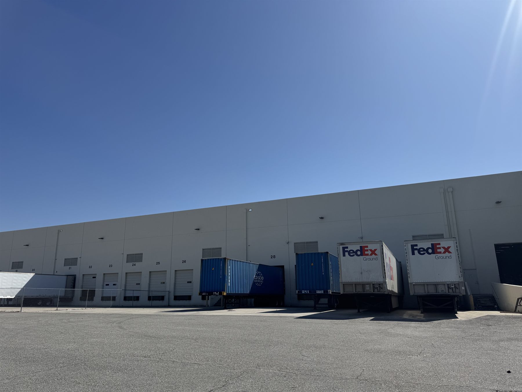 Warehouse dock doors ready for container unloading